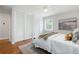 Serene bedroom with hardwood floors, large closet space, and natural light at 3383 Campbell Se Rd, Smyrna, GA 30080