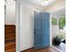 Welcoming entryway featuring hardwood floors, a closet, and stairs leading to the upper level of the home at 3383 Campbell Se Rd, Smyrna, GA 30080