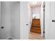 Hallway with wooden staircase at 3383 Campbell Se Rd, Smyrna, GA 30080