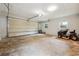 This garage features a new lawn mower at 798 Bankshire Dr, Suwanee, GA 30024