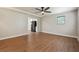 This living room features wood floors and a view of the kitchen at 798 Bankshire Dr, Suwanee, GA 30024