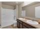 Bathroom featuring double sinks and a tub-shower combo offering modern convenience at 820 Lake Chase, Fairburn, GA 30213