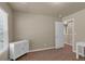Bedroom with closet and a small cabinet, offers a simple and functional design at 820 Lake Chase, Fairburn, GA 30213