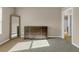 Bedroom featuring dresser, mirror, neutral walls, and carpeted flooring with sunlit window at 820 Lake Chase, Fairburn, GA 30213