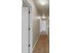 Hallway with neutral walls and carpet offering seamless transition between rooms at 820 Lake Chase, Fairburn, GA 30213