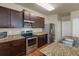 Kitchen featuring stainless steel appliances and granite countertops at 820 Lake Chase, Fairburn, GA 30213