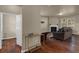 Comfortable living room with hardwood floors, fireplace, and neutral color palette at 820 Lake Chase, Fairburn, GA 30213