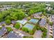 Aerial view showcasing the community's pool, tennis courts, and beautiful landscaping at 2301 Waters Edge Trl, Roswell, GA 30075
