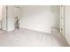 Spacious bedroom with open doorways to closets and a landing at 2301 Waters Edge Trl, Roswell, GA 30075