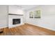 Bright living room features hardwood floors, a fireplace, and natural light at 3007 Stratford Arms Dr, Chamblee, GA 30341