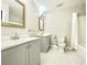 Bathroom featuring double sinks, a tiled floor, and a shower-tub combination at 326 Old Farm Road, Woodstock, GA 30188