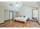 The primary bedroom offers plenty of space and natural light from a corner window at 3493 Wood Acres Blvd, Duluth, GA 30096