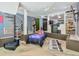 Bedroom featuring a spiral staircase and unique décor at 3493 Wood Acres Blvd, Duluth, GA 30096