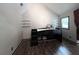 Cozy bedroom featuring vaulted ceilings, wood floors, and lots of built-in storage at 3493 Wood Acres Blvd, Duluth, GA 30096