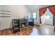 Cozy bedroom with unique bunk bed, hardwood floors, and natural light at 3493 Wood Acres Blvd, Duluth, GA 30096
