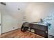 Bedroom with bunk beds, hardwood floors, and shelving at 3493 Wood Acres Blvd, Duluth, GA 30096
