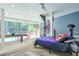 Bedroom with spiral staircase and view to the pool at 3493 Wood Acres Blvd, Duluth, GA 30096