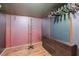 Walk-in closet with shelving, hardwood floors, and drawers at 3493 Wood Acres Blvd, Duluth, GA 30096