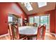 Formal dining room with hardwood floors, chandelier, and sliding glass doors at 3493 Wood Acres Blvd, Duluth, GA 30096
