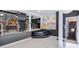 Spacious game room with bar and colorful pixel art wall decorations at 3493 Wood Acres Blvd, Duluth, GA 30096