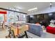 Basement game room with foosball table, comfortable seating, and bar area at 3493 Wood Acres Blvd, Duluth, GA 30096