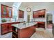 Modern kitchen design with custom cabinets, granite countertops, and stainless steel appliances at 3493 Wood Acres Blvd, Duluth, GA 30096