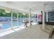 Bright recreation room with pool access, foosball table, and ample space for entertaining at 3493 Wood Acres Blvd, Duluth, GA 30096