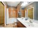 Bathroom featuring double vanity, tile floors, shower and tub combination at 898 Oak Sw St # 3207, Atlanta, GA 30310