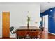 Cozy dining area featuring a wood table with seating for four and a modern vase with greenery accent at 898 Oak Sw St # 3207, Atlanta, GA 30310