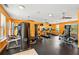 Gym featuring treadmills, weight machines, mirrored wall, and ceiling fans at 898 Oak Sw St # 3207, Atlanta, GA 30310