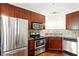 Modern kitchen featuring stainless steel appliances, granite countertops, and ample cabinet space at 898 Oak Sw St # 3207, Atlanta, GA 30310