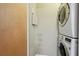 Convenient laundry closet with stacked washer and dryer unit, maximizing space in condo at 898 Oak Sw St # 3207, Atlanta, GA 30310
