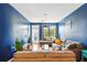 Bright living room with hardwood floors, a comfortable grey sofa, and large windows at 898 Oak Sw St # 3207, Atlanta, GA 30310