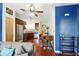 Open-concept living room with hardwood floors, stainless steel appliances, and adjacent dining area at 898 Oak Sw St # 3207, Atlanta, GA 30310