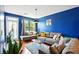 Bright living room with modern furnishings, hardwood floors, and a large window for ample natural light at 898 Oak Sw St # 3207, Atlanta, GA 30310