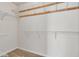 Walk-in closet with installed wire shelving and carpet at 1220 Skipping Rock Sw Ln, Grayson, GA 30017