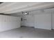 Spacious garage with built-in cabinets for ample storage at 1220 Skipping Rock Sw Ln, Grayson, GA 30017