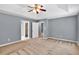 A spacious main bedroom with carpet, tray ceilings, and ensuite access at 1220 Skipping Rock Sw Ln, Grayson, GA 30017