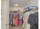 Walk-in closet featuring organized shelving, hanging space, and ample storage capacity at 2478 Roseberry Ln, Grayson, GA 30017