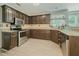 Updated kitchen features stainless steel appliances and granite countertops at 2478 Roseberry Ln, Grayson, GA 30017