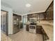 Spacious kitchen with stainless steel appliances and granite countertops at 2478 Roseberry Ln, Grayson, GA 30017