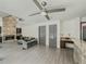 Comfortable living room with stone fireplace and hardwood floors at 2478 Roseberry Ln, Grayson, GA 30017