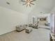 Vaulted living room with ample seating and great flow into the kitchen at 2478 Roseberry Ln, Grayson, GA 30017