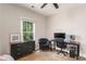 This bedroom features a desk, a chair, a dresser, and a window at 2484 Mcafee Rd, Decatur, GA 30032