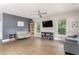 Spacious living room with hardwood floors, built-in shelving, and natural light at 2484 Mcafee Rd, Decatur, GA 30032