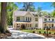 Beautiful two-story home with a welcoming porch and well-manicured landscaping, creating instant curb appeal at 2553 Creekwood Ter, Decatur, GA 30030