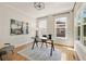 Bright home office with hardwood floors, large windows, and a modern desk setup at 2553 Creekwood Ter, Decatur, GA 30030