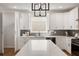 Bright kitchen showcases white cabinetry, a large island, and modern fixtures at 2553 Creekwood Ter, Decatur, GA 30030