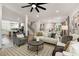 Spacious living room features an open floor plan with hardwood floors, modern lighting, and neutral tones at 2553 Creekwood Ter, Decatur, GA 30030