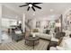 Bright, open-concept living room with hardwood floors and neutral decor at 2553 Creekwood Ter, Decatur, GA 30030
